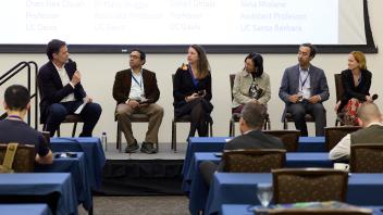 computational health panel engaged in discussion on stage